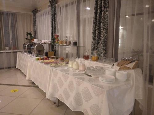 Restoran või mõni muu söögikoht majutusasutuses Garni Hotel Sibiria