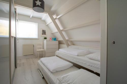 Postel nebo postele na pokoji v ubytování Sandepark 165- Groote Keeten
