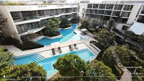 an overhead view of a building with two swimming pools at VERANDA HUAHIN - Residence Pool Access in Hua Hin