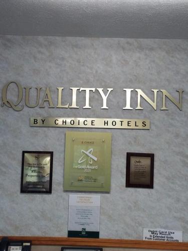 a sign on the wall of a hotel at Quality Inn New River Gorge in Fayetteville