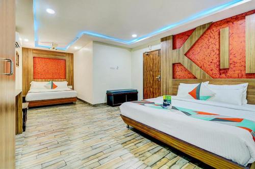 Postel nebo postele na pokoji v ubytování The K11 Hotels - T Nagar