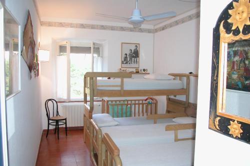 Krevet ili kreveti na sprat u jedinici u okviru objekta Villa Capo D'arco