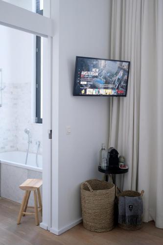 TV a/nebo společenská místnost v ubytování The 1880 Residence by Domani Hotels