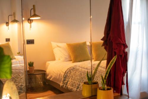 Ένα ή περισσότερα κρεβάτια σε δωμάτιο στο Philos Guesthouse