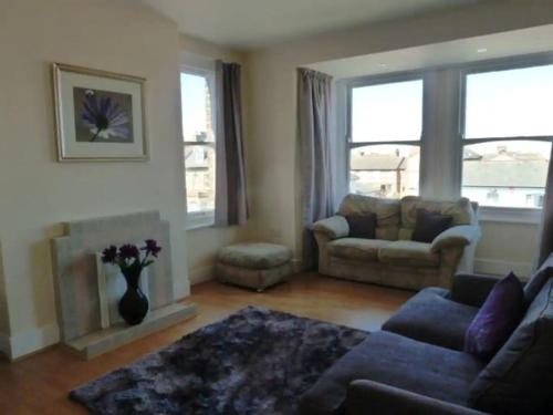 Χώρος καθιστικού στο Top floor flat with sea view