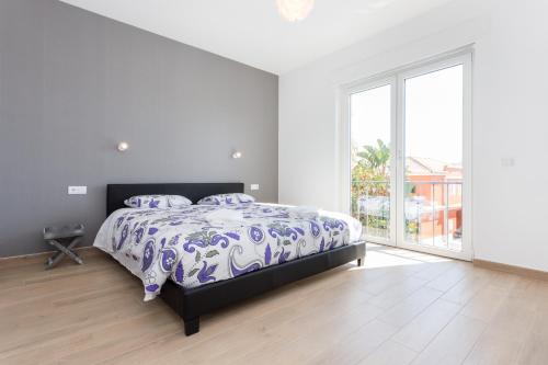 En eller flere senge i et værelse på CoolHouses Algarve, Casa Marisa, V5 Burgau