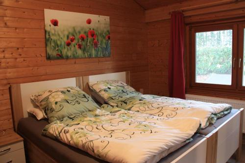 Postel nebo postele na pokoji v ubytování Ferienhaus Buchenblick