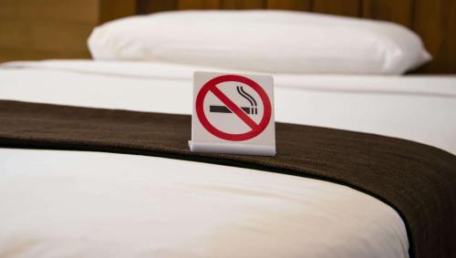 Ein Bett oder Betten in einem Zimmer der Unterkunft Golden Wheat Budget Host Inn Junction City