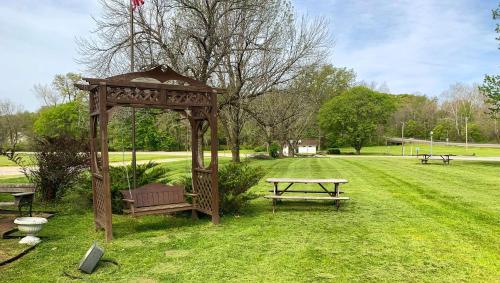 a park with a gazebo and a picnic table at Royal Inn Rockville in Rockville