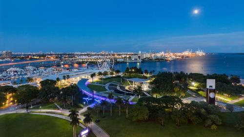 an aerial view of a harbor at night at YVE Hotel Miami in Miami