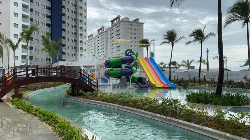 a water park with a slide in the water at SALINAS EXCLUSIVE RESORT in Salinópolis