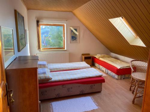Postel nebo postele na pokoji v ubytování Penzión Malý Rím