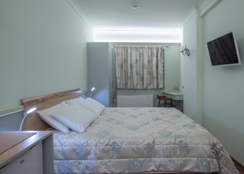 Letto o letti in una camera di La Voglia Hotel Boutique