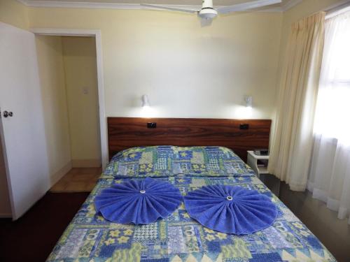 Кровать или кровати в номере Panorama Seaside Apartments Norfolk Island