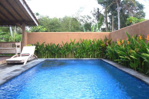 Kolam renang di atau dekat dengan Nauna Villa Ubud