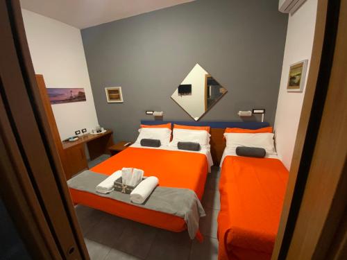 Postel nebo postele na pokoji v ubytování Albergo Villa Marina