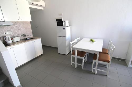 Η κουζίνα ή μικρή κουζίνα στο Lantiana Napa Aparthotel 
