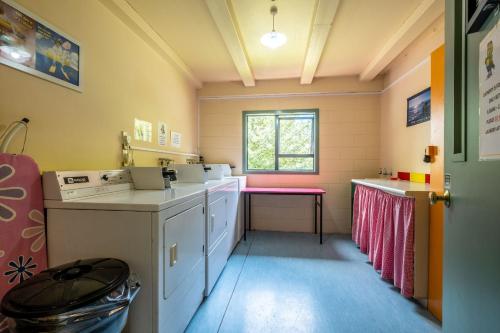 A kitchen or kitchenette at Kakapo Lodge