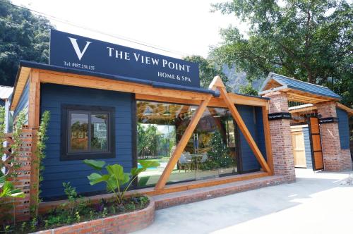 a blue building with a sign that reads the view point at Ninh Binh The View Point Home & Spa in Ninh Binh
