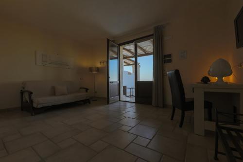 Postel nebo postele na pokoji v ubytování Corte Di Ferro Hotel & Wellness Resort