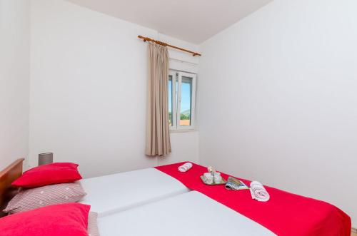 
Ein Bett oder Betten in einem Zimmer der Unterkunft Kljunak Apartment
