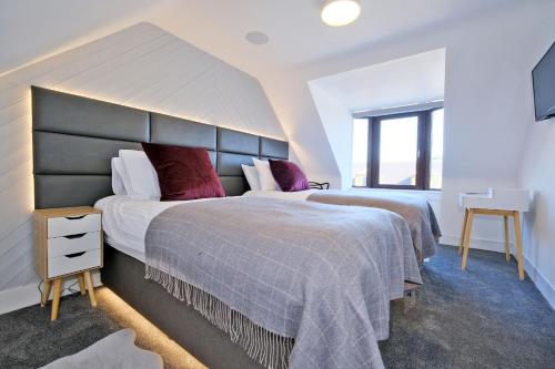 Postel nebo postele na pokoji v ubytování Ben Shea Smart Home