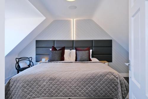 Postel nebo postele na pokoji v ubytování Ben Shea Smart Home