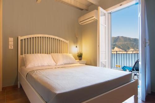 Кровать или кровати в номере Villa M