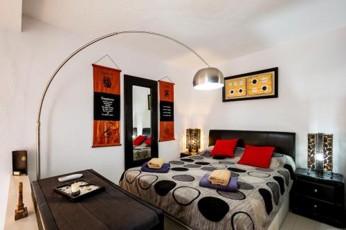 Postel nebo postele na pokoji v ubytování Bungalow Costa Adeje Cortijo 2-4