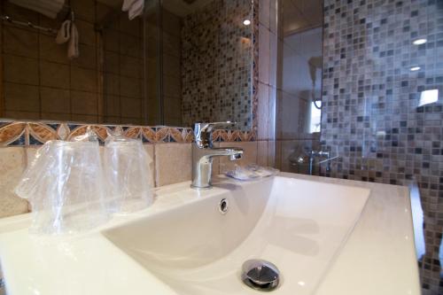 Phòng tắm tại Hotel Hispania