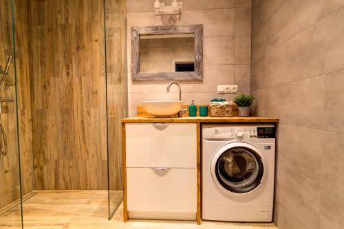 Η κουζίνα ή μικρή κουζίνα στο Apartamenty u Rybki Krynica - Zdrój