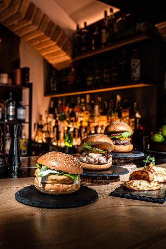 a group of sandwiches sitting on a counter in a bar at Malatesta Antica Dimora in Longiano