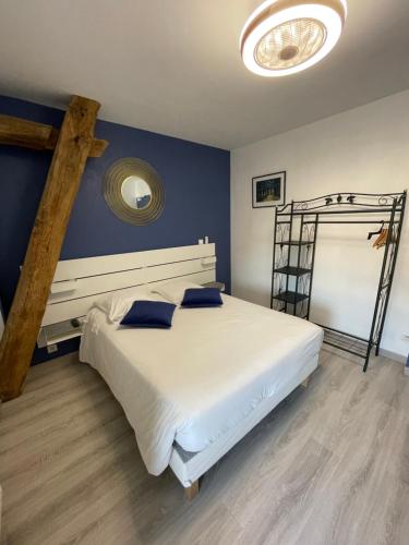 Postel nebo postele na pokoji v ubytování Sarl Macarena