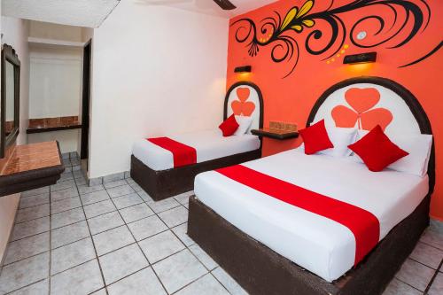 Postel nebo postele na pokoji v ubytování Hotel América