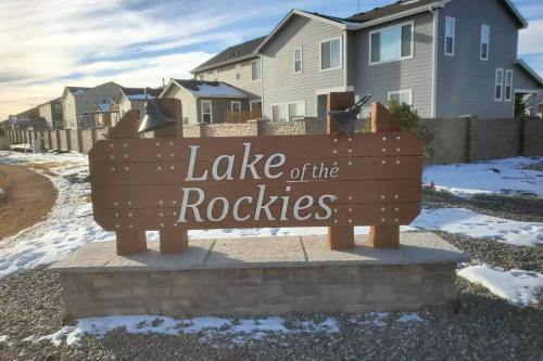 a sign for lake of the roaches in front of a house at Large Brand-New Home Close to Lake & Mountains in Monument