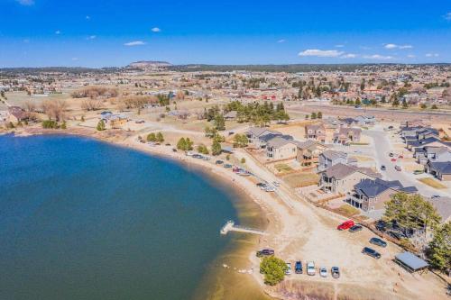 an aerial view of a beach with a resort at Large Brand-New Home Close to Lake & Mountains in Monument
