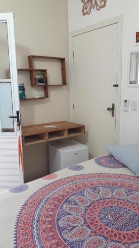 Postel nebo postele na pokoji v ubytování Pousada e SPA Shiva São Sebastião 200mts da praia