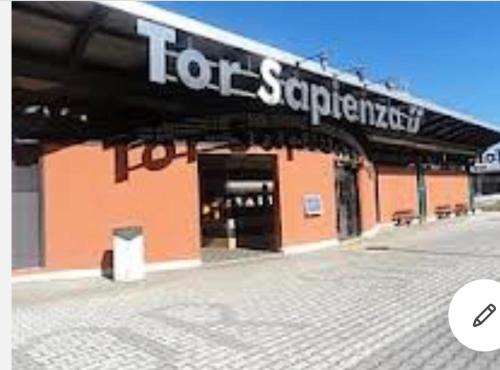 a store with a sign on the front of it at Ale e Nau in Rome
