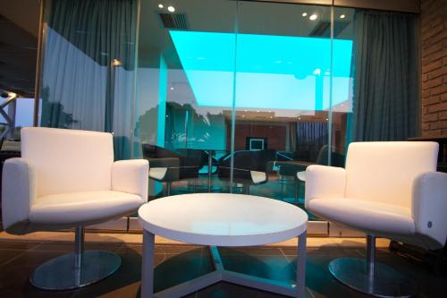 Zona de estar de Elysion Hotel
