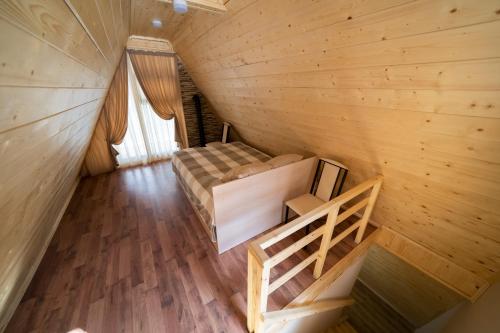 an overhead view of a bedroom in a tiny house at Woodland cottages in Tsaghkadzor