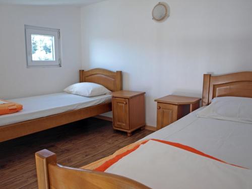 Ένα ή περισσότερα κρεβάτια σε δωμάτιο στο Arabela Apartments