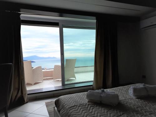 Ένα ή περισσότερα κρεβάτια σε δωμάτιο στο Villa Treglia b&b
