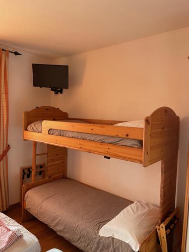 Poschodová posteľ alebo postele v izbe v ubytovaní Hotel Culmine