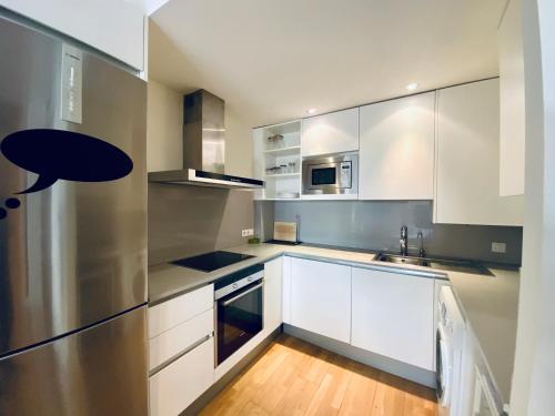 Η κουζίνα ή μικρή κουζίνα στο Apartaments Santa Clara – Baltack Homes