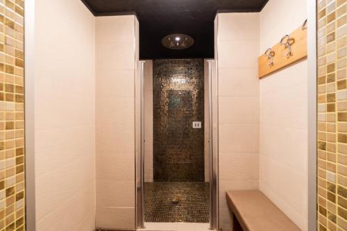 a walk in shower with a glass door in a bathroom at Best Western Plus Hotel Perla Del Porto in Catanzaro Lido