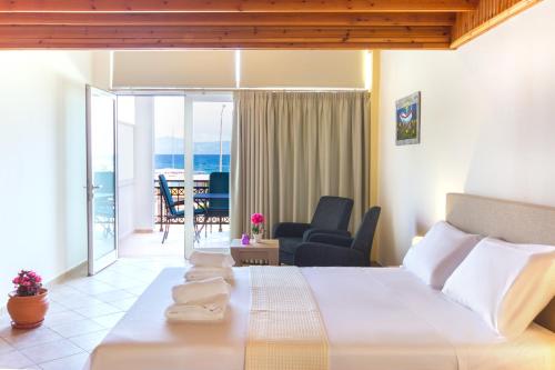 A bed or beds in a room at Rooms Kavala