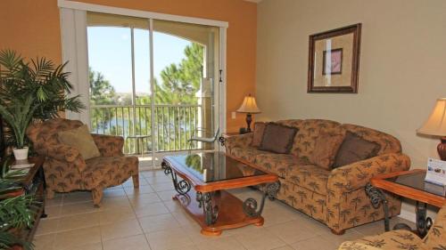 A seating area at Luxury Contemporary Style Condo on Windsor Hills Resort, Orlando Condo 4850