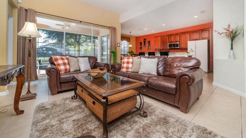 A seating area at Luxury Contemporary Style Villa on Windsor Hills Resort, Orlando Villa 5006