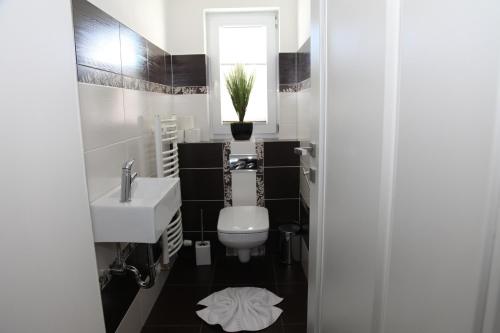 Bathroom sa Apartment Tannheim