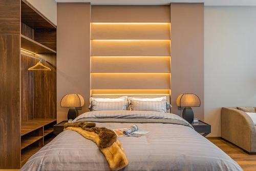 Katil atau katil-katil dalam bilik di Kunming Hotel High Sky View Apartment